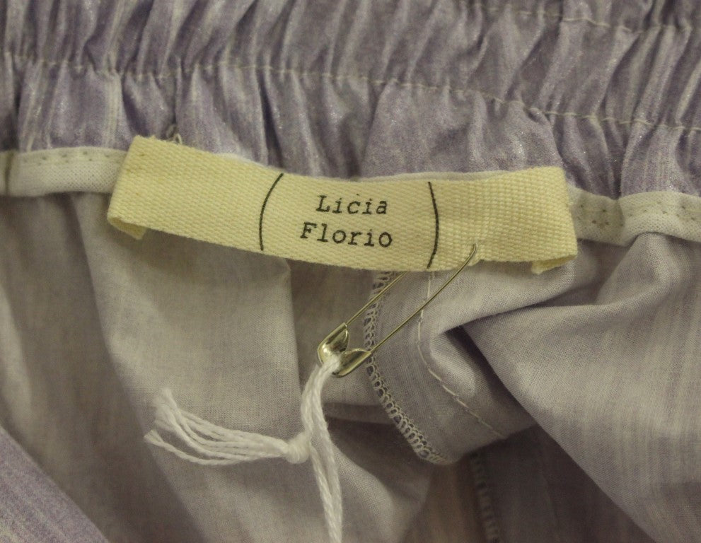 Purple lingerie with white label that says "Licia Florio"