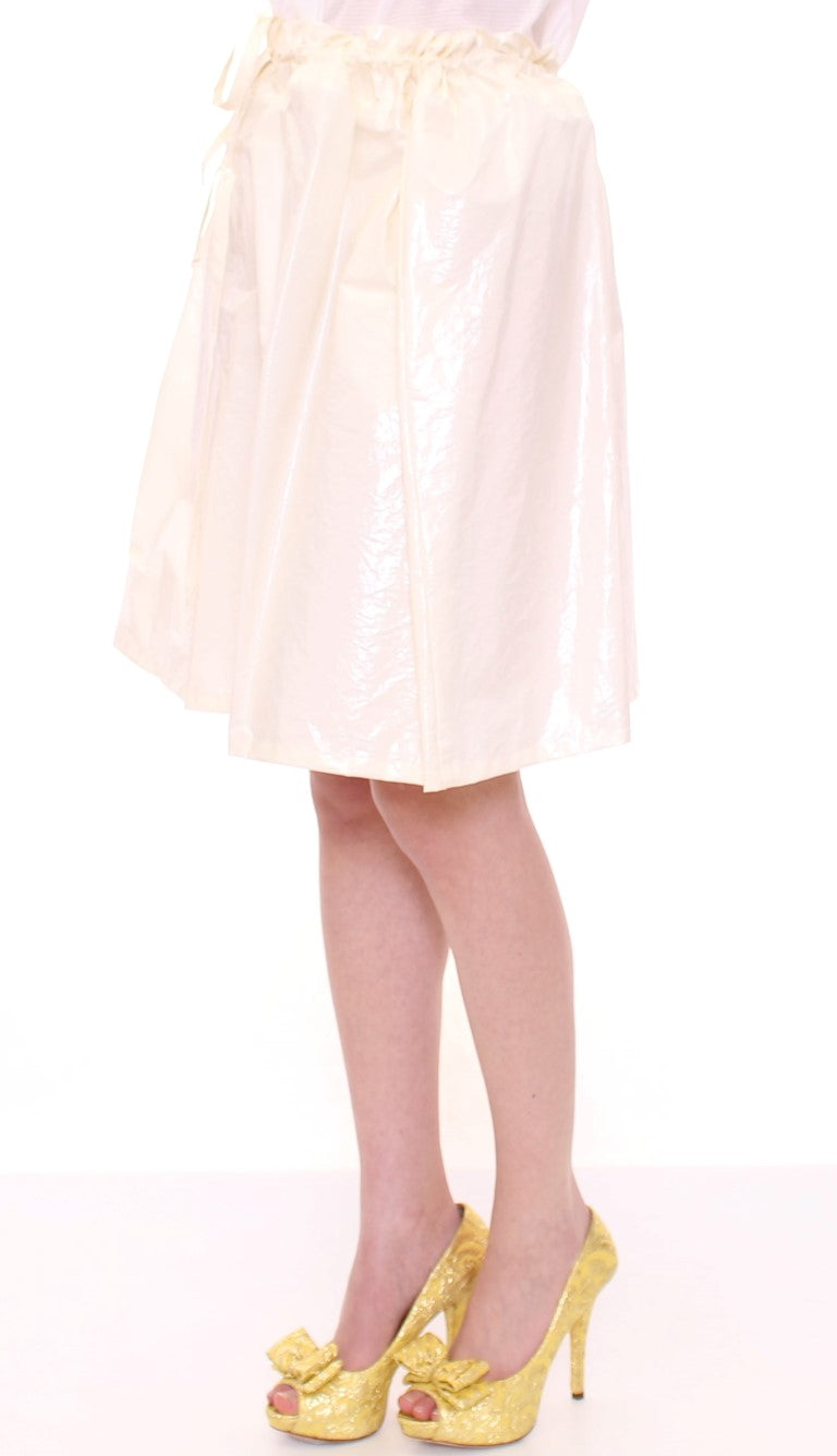 Woman wearing a skirt and yellow shoes