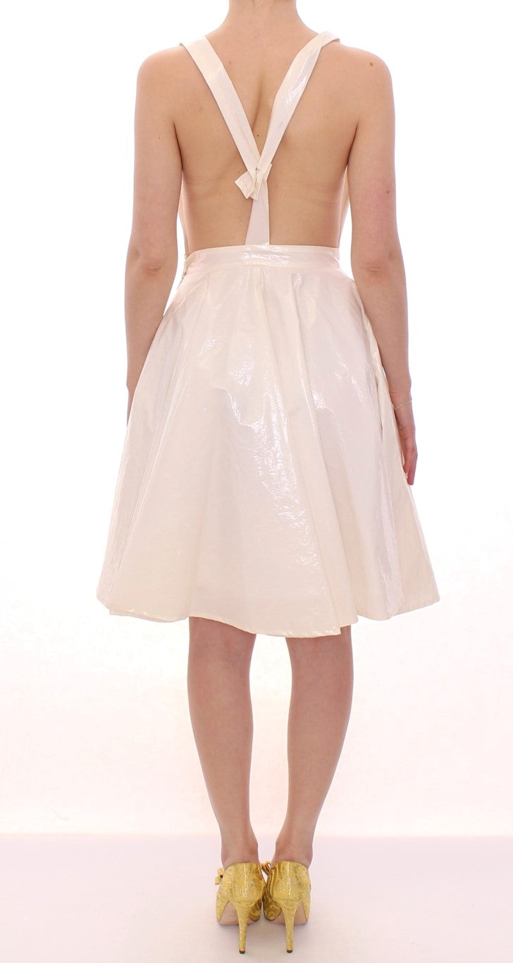 Backless white dress with shiny material
