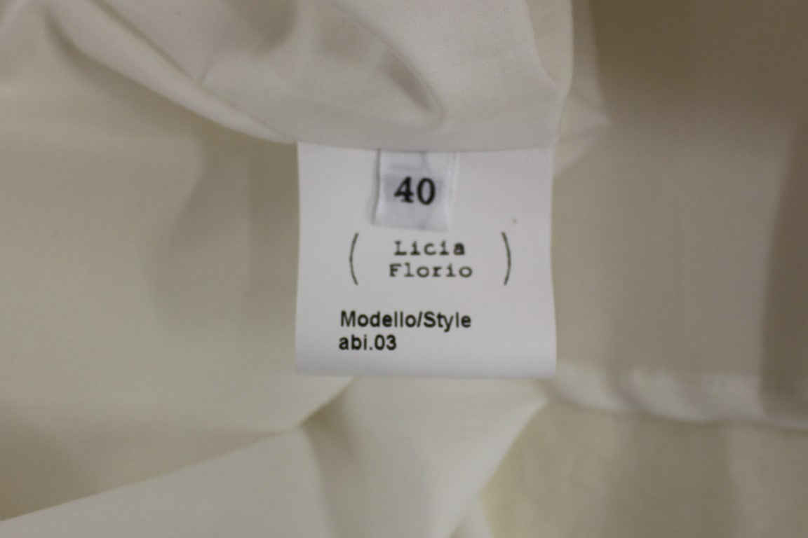 White tag on fabric with black writing indicating model number, name, style, and size