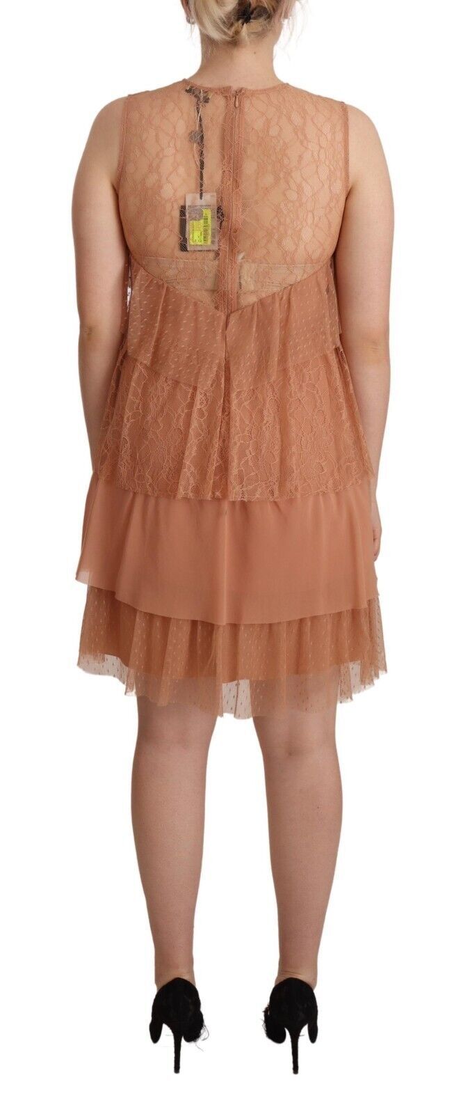 A pink lace sleeveless mini shift dress with layered design