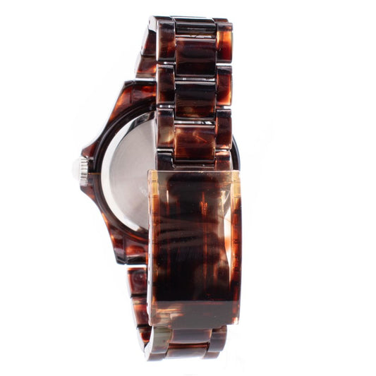 A brown polyethylene watch with a clear face and gold accents