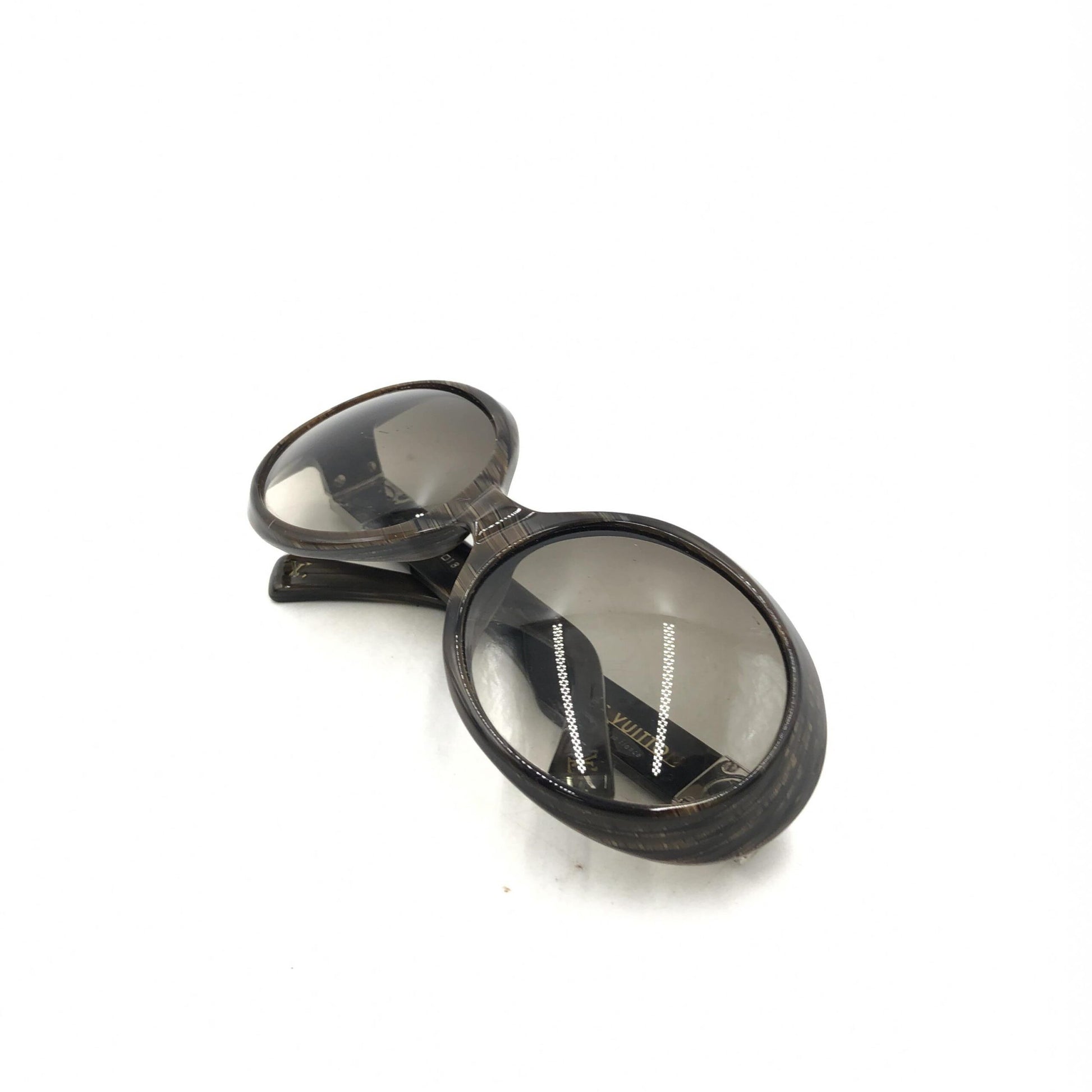 Pair of round sunglasses with black frame