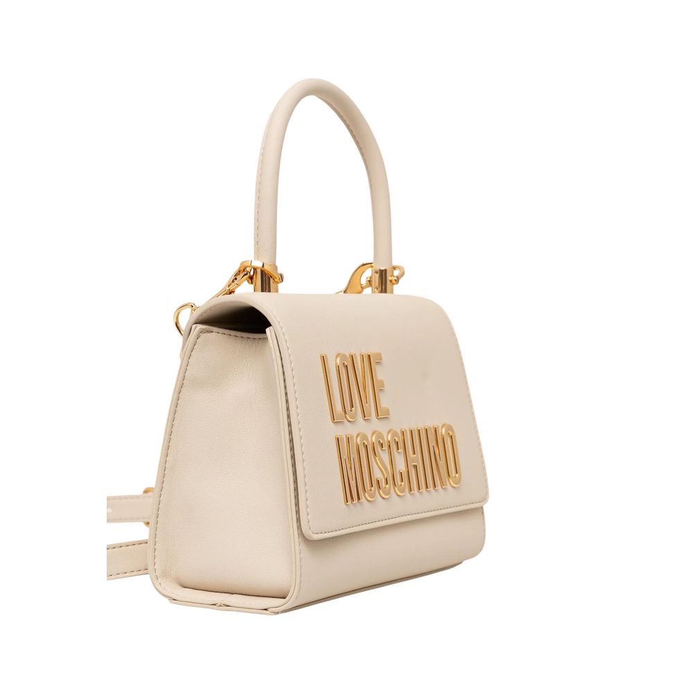 Small beige handbag with gold accents and a logo that says "live love shop"