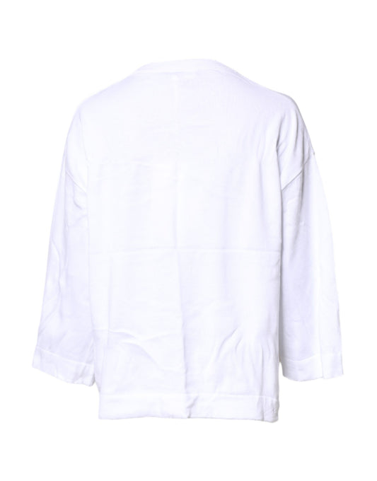 White long sleeve shirt on hanger