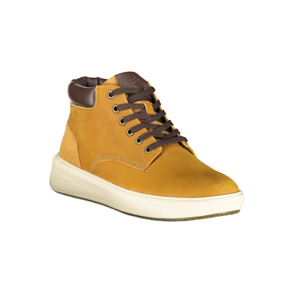 A yellow men's sneaker with a rubber sole, laces, and a sturdy design