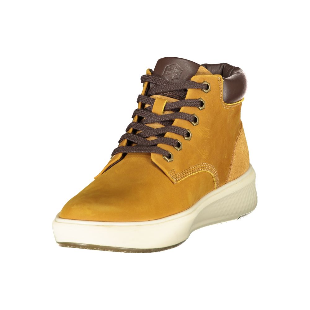 A yellow men's sneaker with a rubber sole, laces, and a pull tab at the back