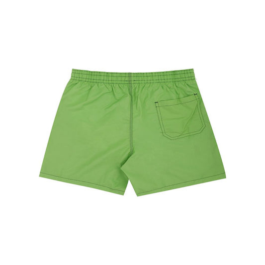A pair of green swim shorts with pockets