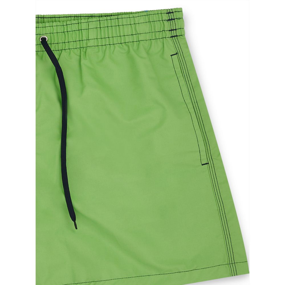 Green swim shorts with black drawstring