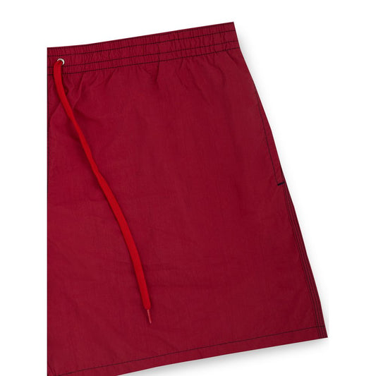 Red swim trunks with drawstring waistband