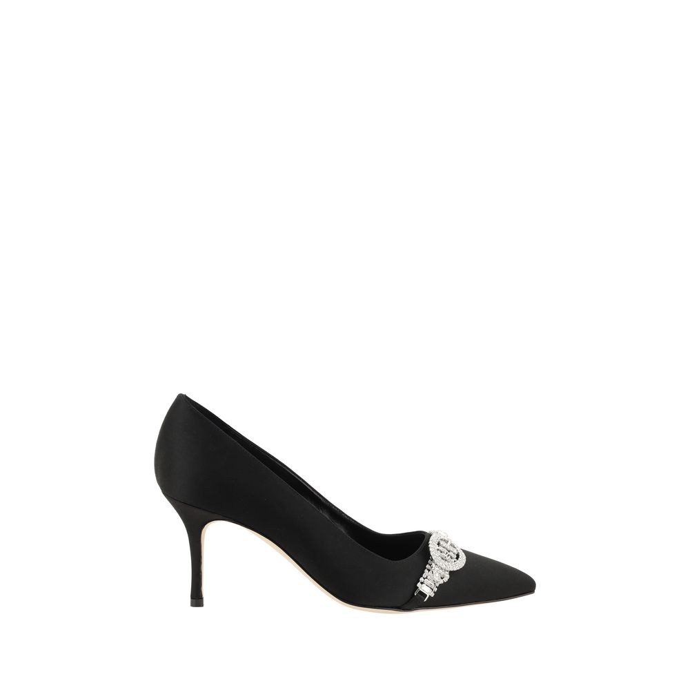 Black high heel shoe with a small diamond on the toe