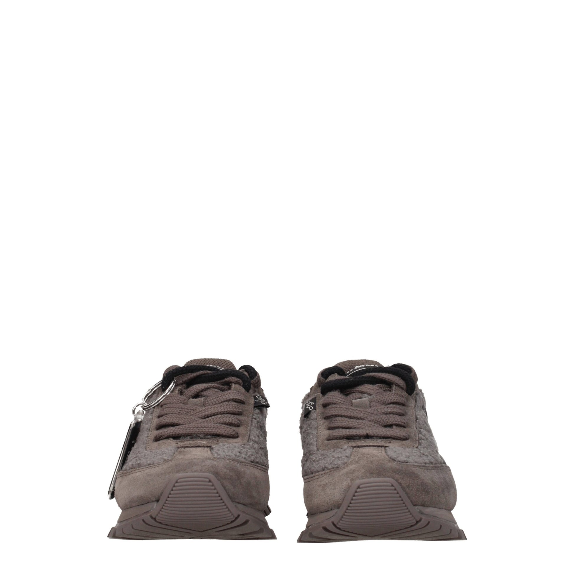 Pair of gray fur chunky sneakers with laces