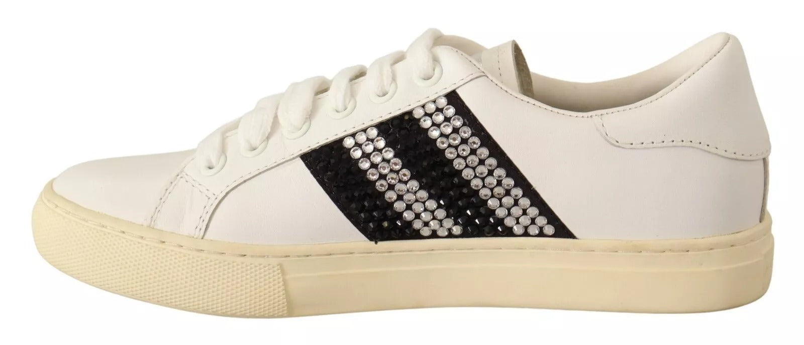 White sneaker with black stripes and white sole