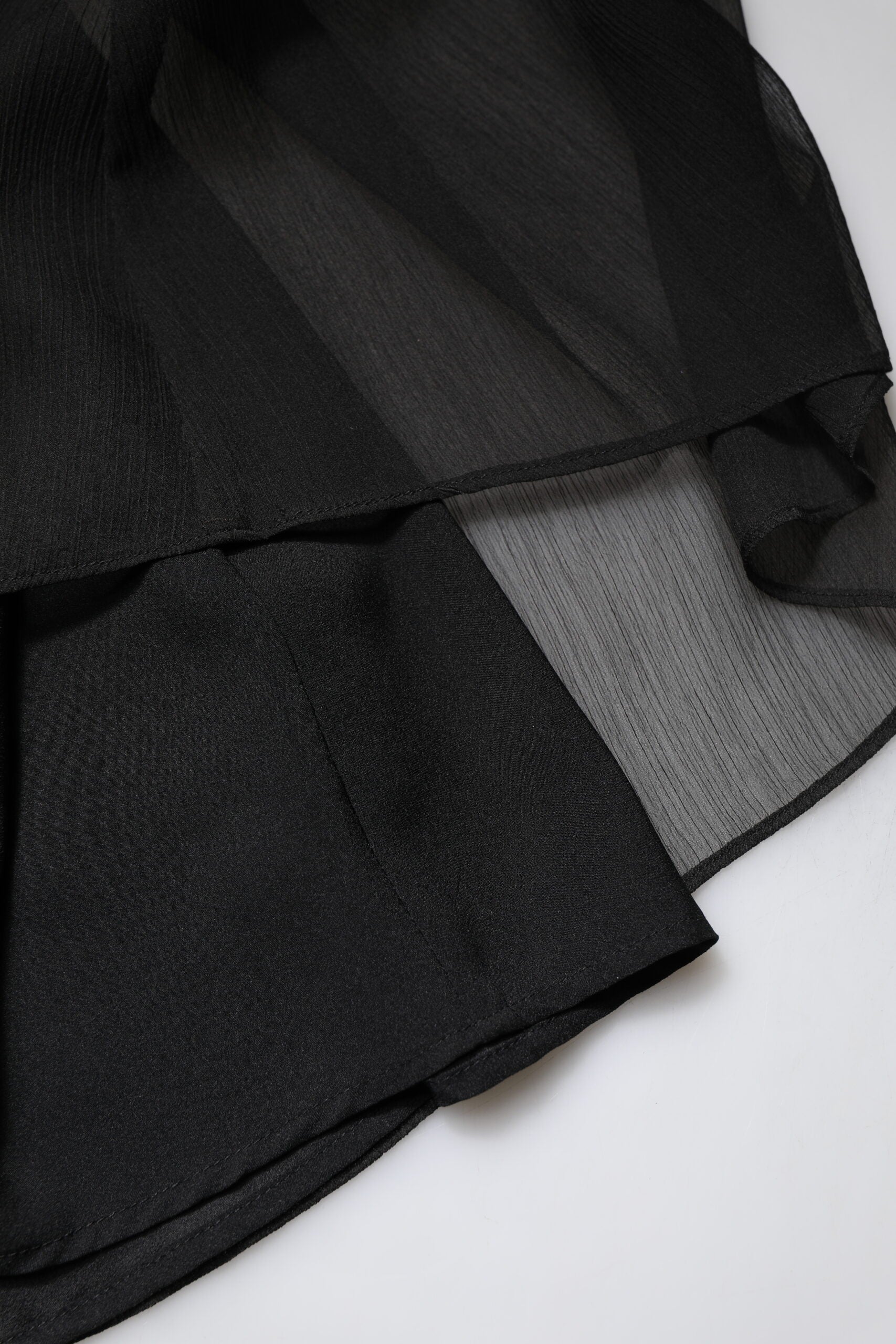 A black tulle pearl sleeveless long gown dress
