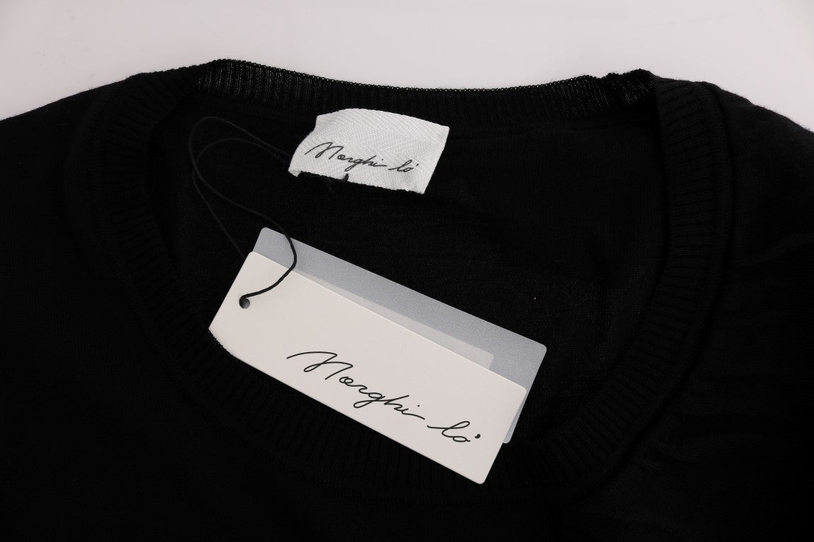 Black sweater on hanger with tag