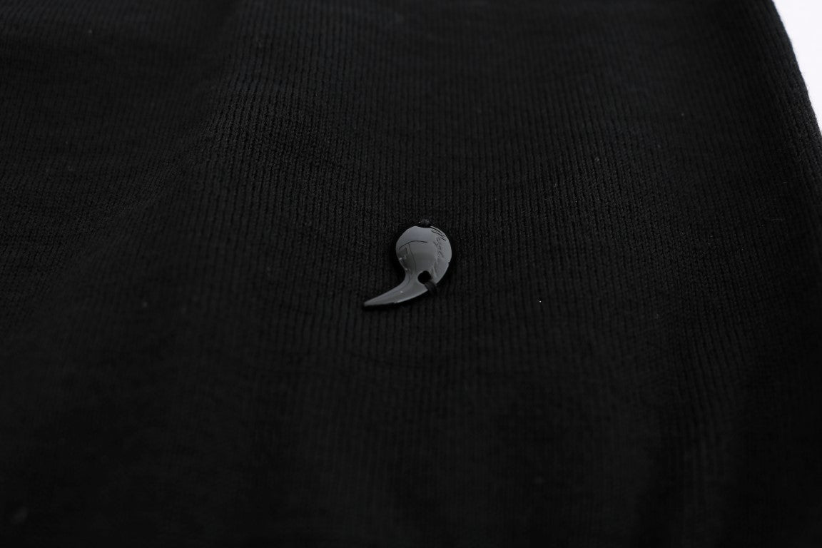 Small round object on black surface