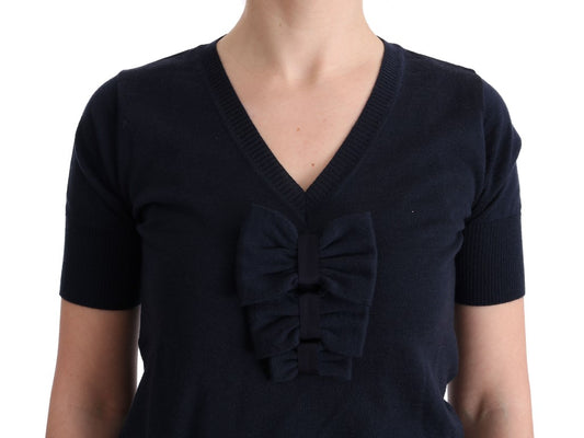 Dark blue knit sweater with bow tie detail on front