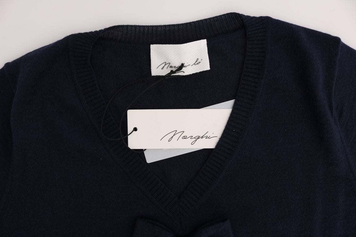 Navy blue sweater on hanger