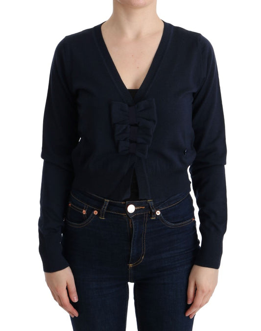 Woman wearing dark blue sweater and jeans