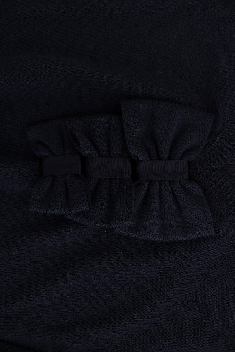 Black bow tie on fabric