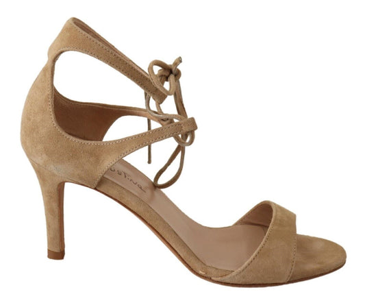 Tan high heel sandals with ankle strap and bow detail