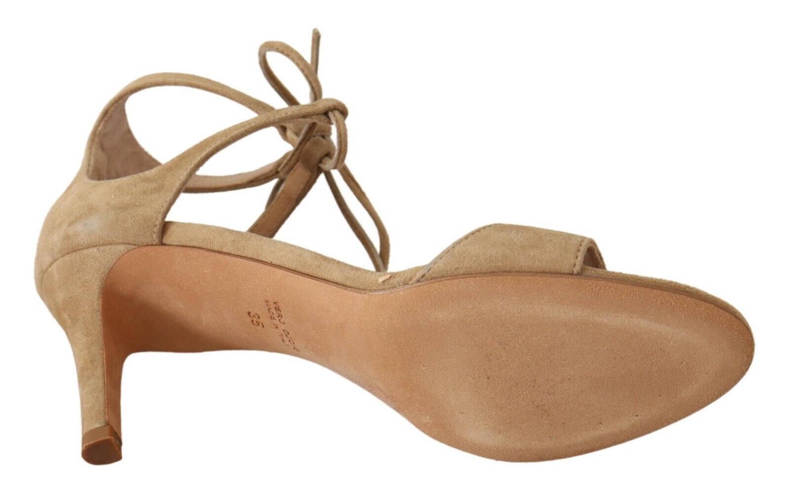 Pair of brown women's dress shoes with laces and a bow on top