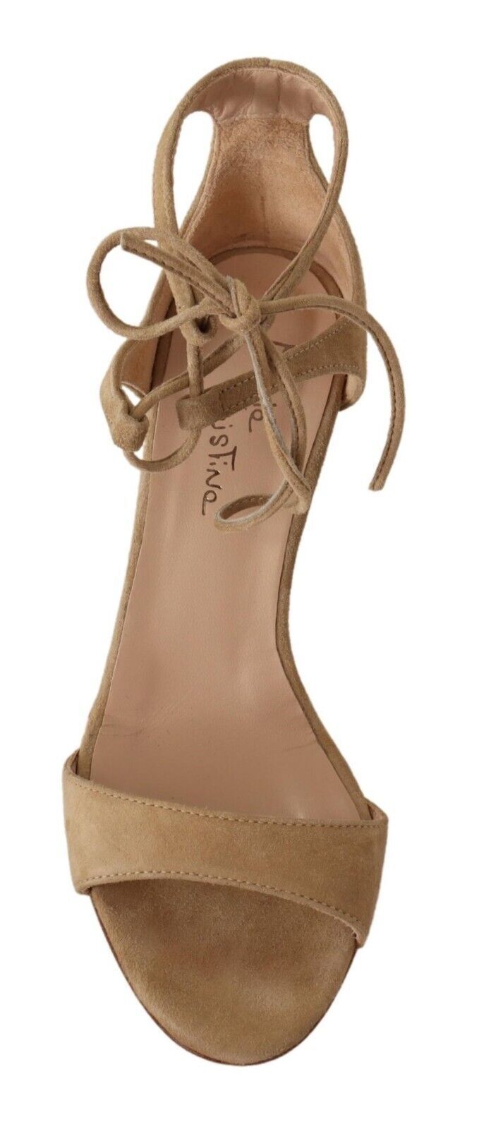 Tan strappy heeled sandal with ankle strap and bow detailing