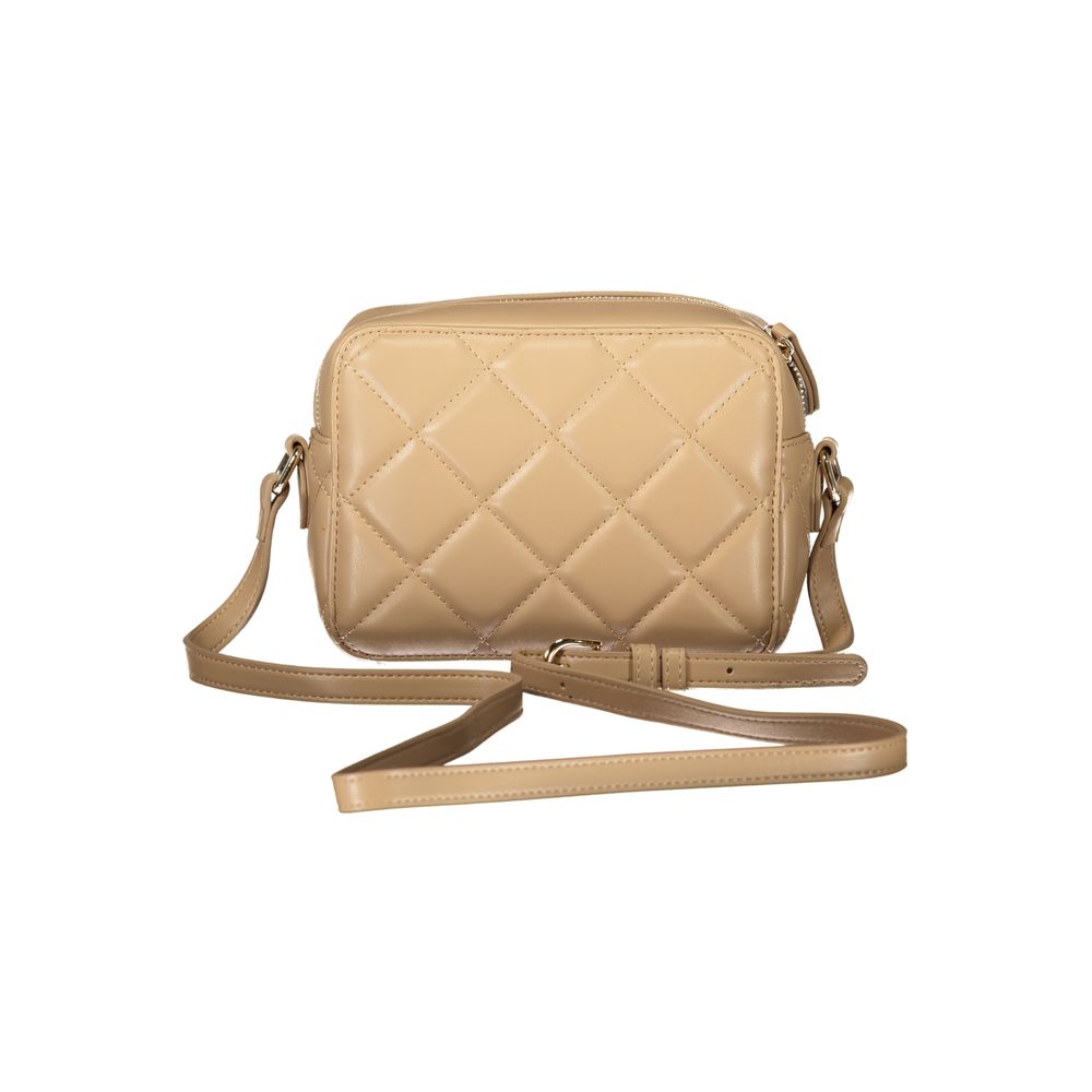 Tan quilted leather crossbody bag with two straps