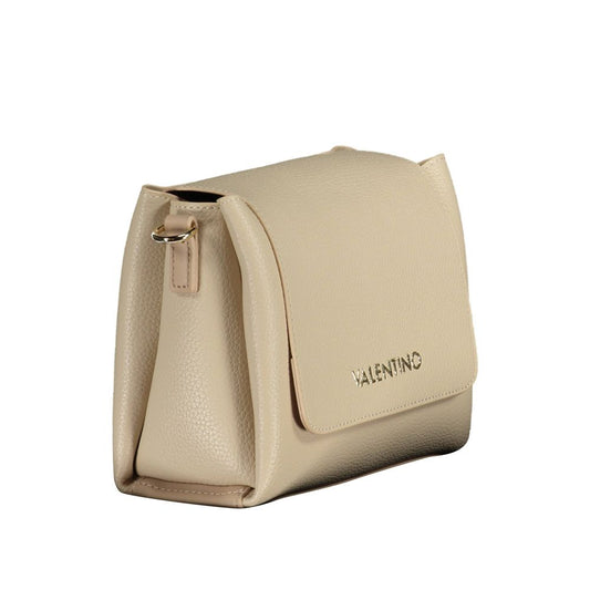 Small leather handbag with a flap top and a strap