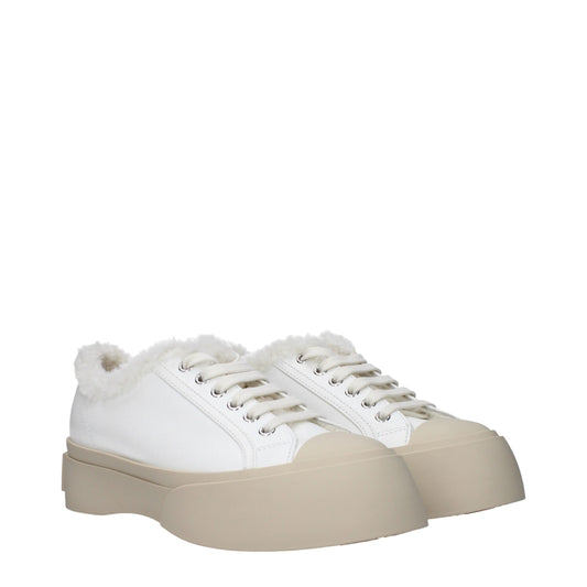 Pair of white leather sneakers with fur trim, lace-up closure, and chunky sole