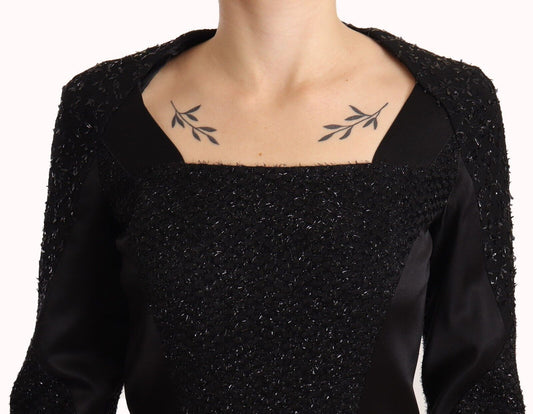 Black dress with studded embellishments and long sleeves, featuring a sheath silhouette
