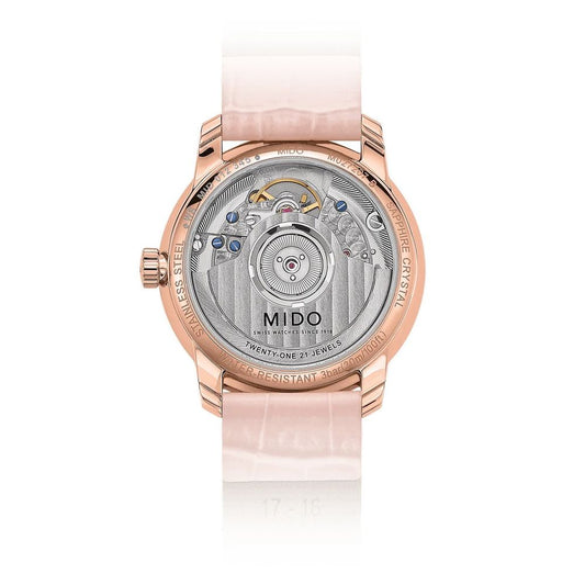Pink watch with multicolored face and leather strap