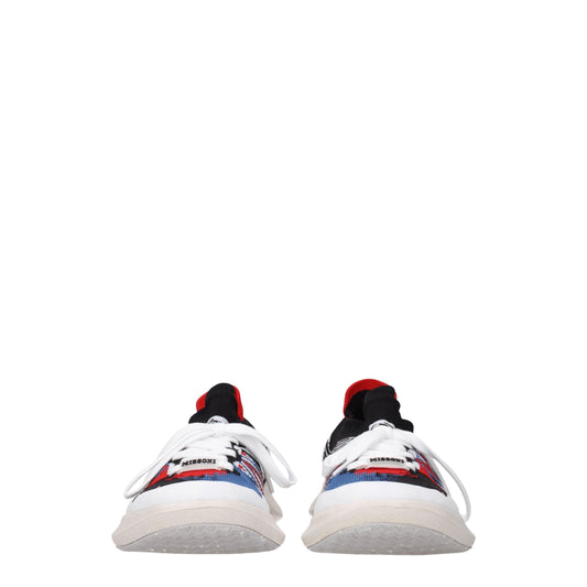 Pair of multicolored sneakers with laces, featuring a patterned design on fabric upper