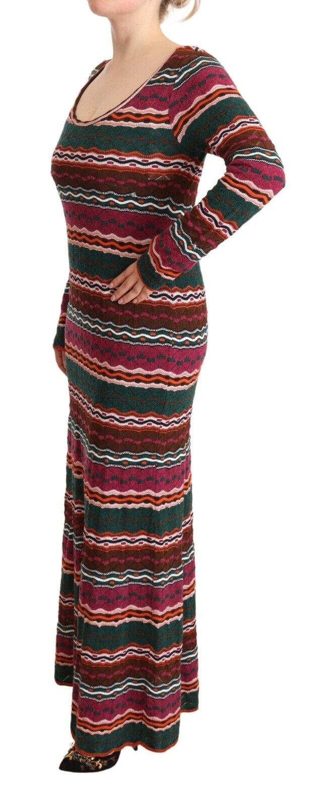 A long sleeved, knit maxi dress with multicolored stripes