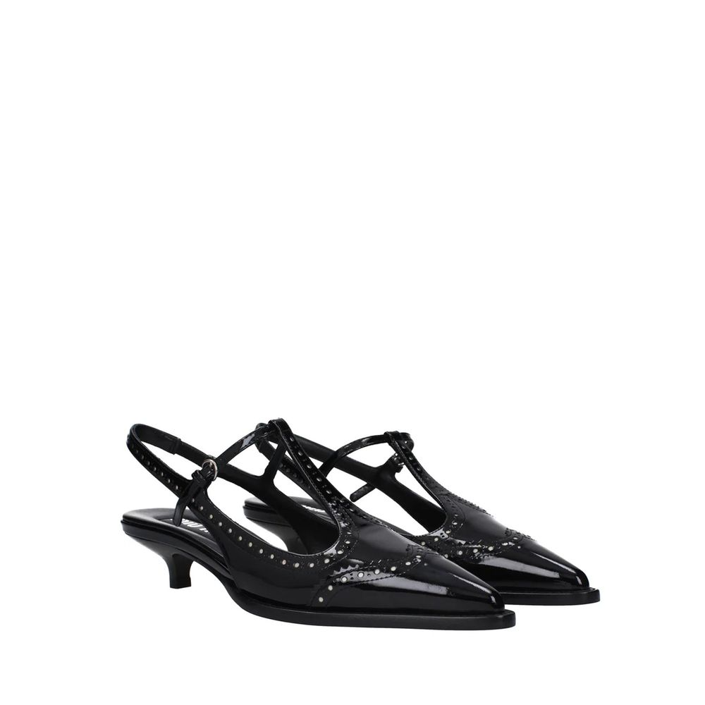 Black high heel shoes with studs on the toe