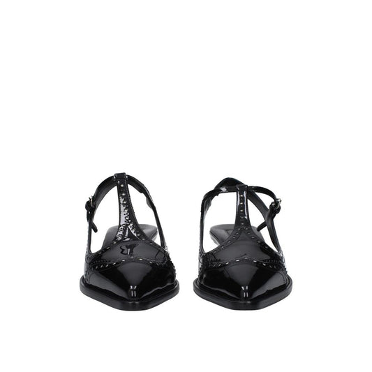 Pair of black high heel shoes with straps