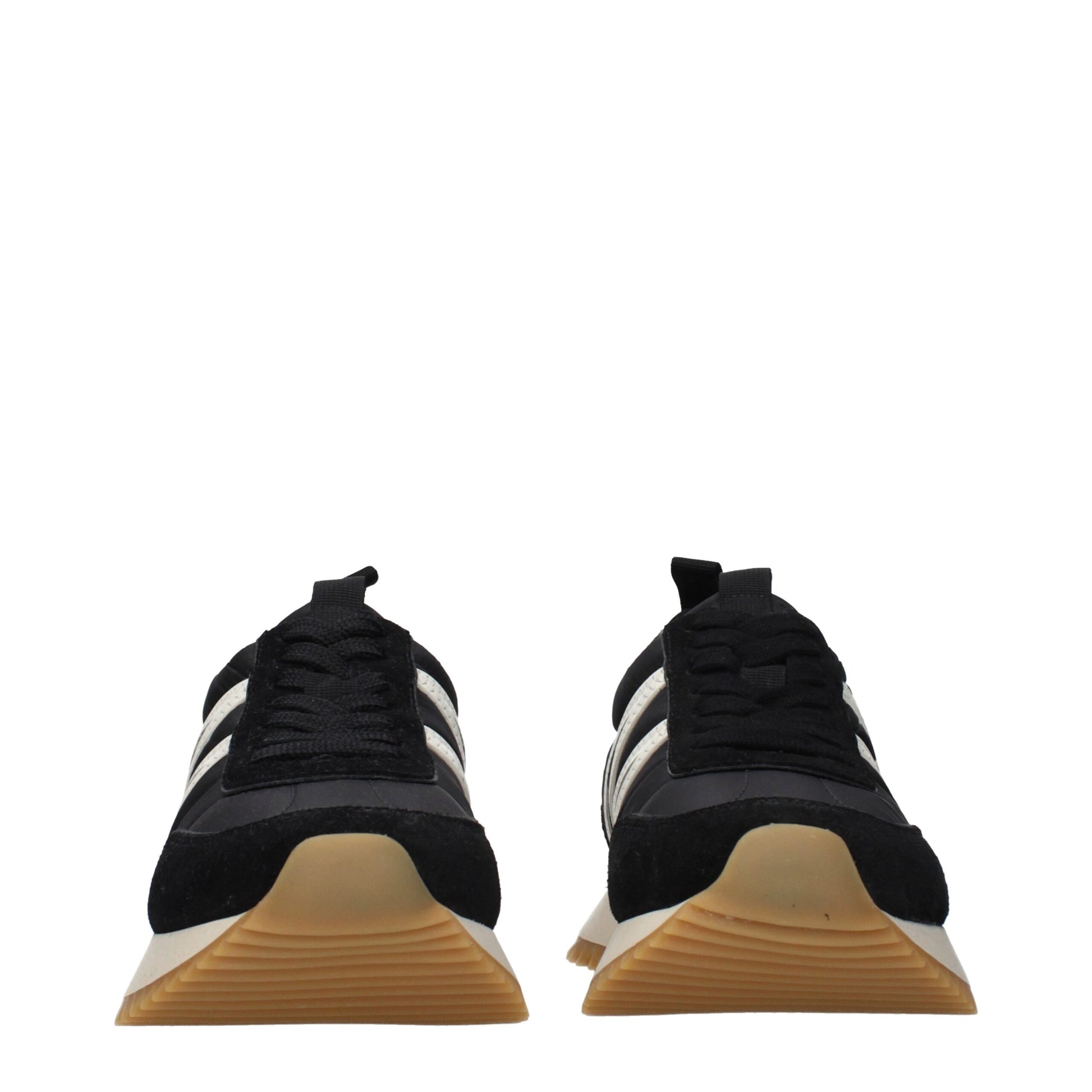 Pair of black sneakers with white stripes on sides, featuring a low top design and rubber soles