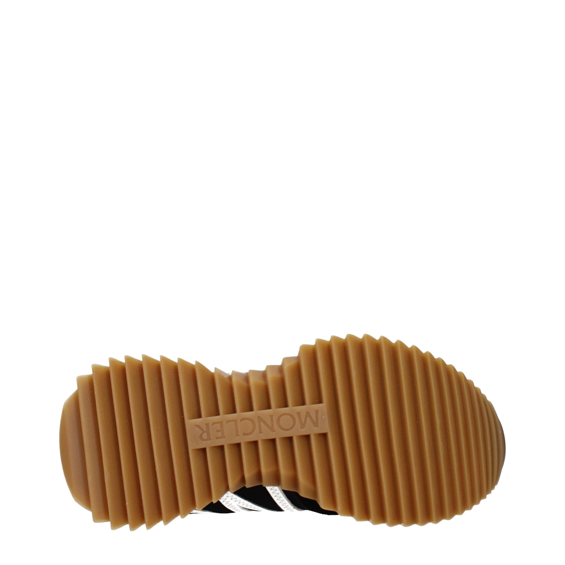A pair of black fabric low top sneakers with a rubber sole, featuring the brand name "Moncler" on the side
