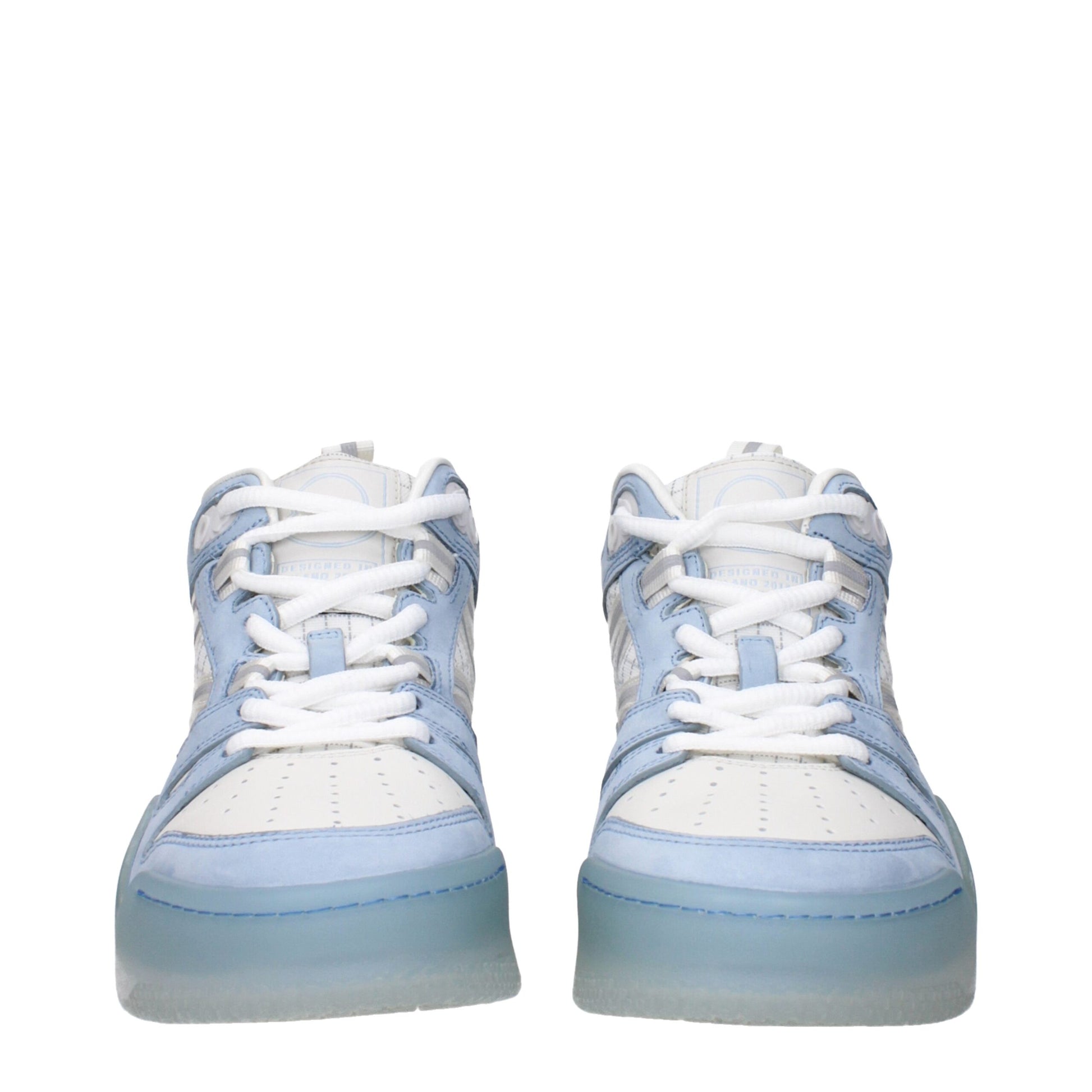 Pair of white leather high top sneakers with blue laces, featuring a chunky sole and a round toe design
