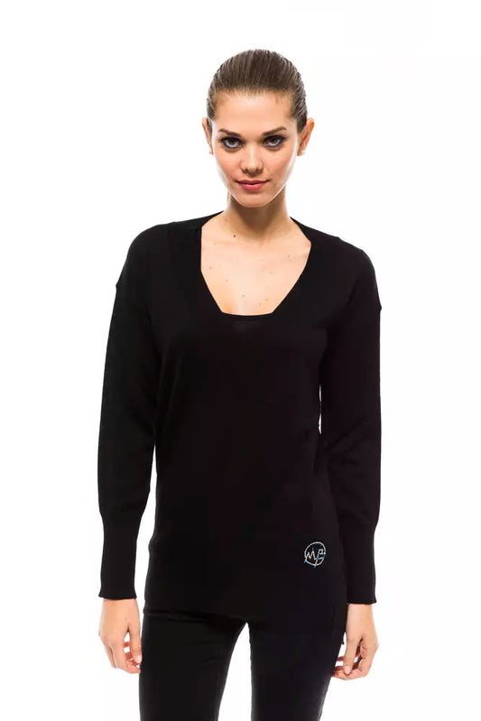 Long sleeve black top on a woman
