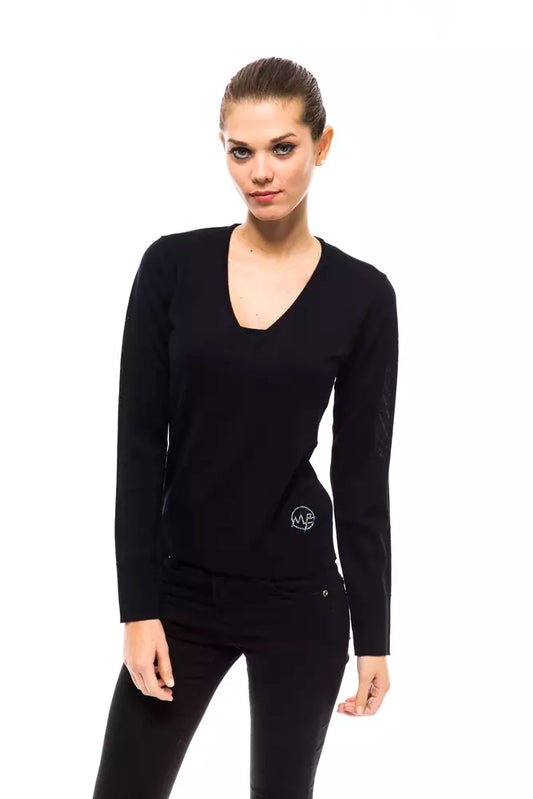 Long sleeve black top on a model