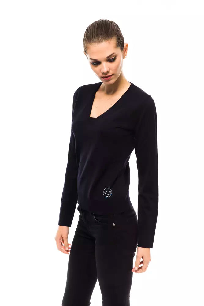 Long sleeve black top on a woman