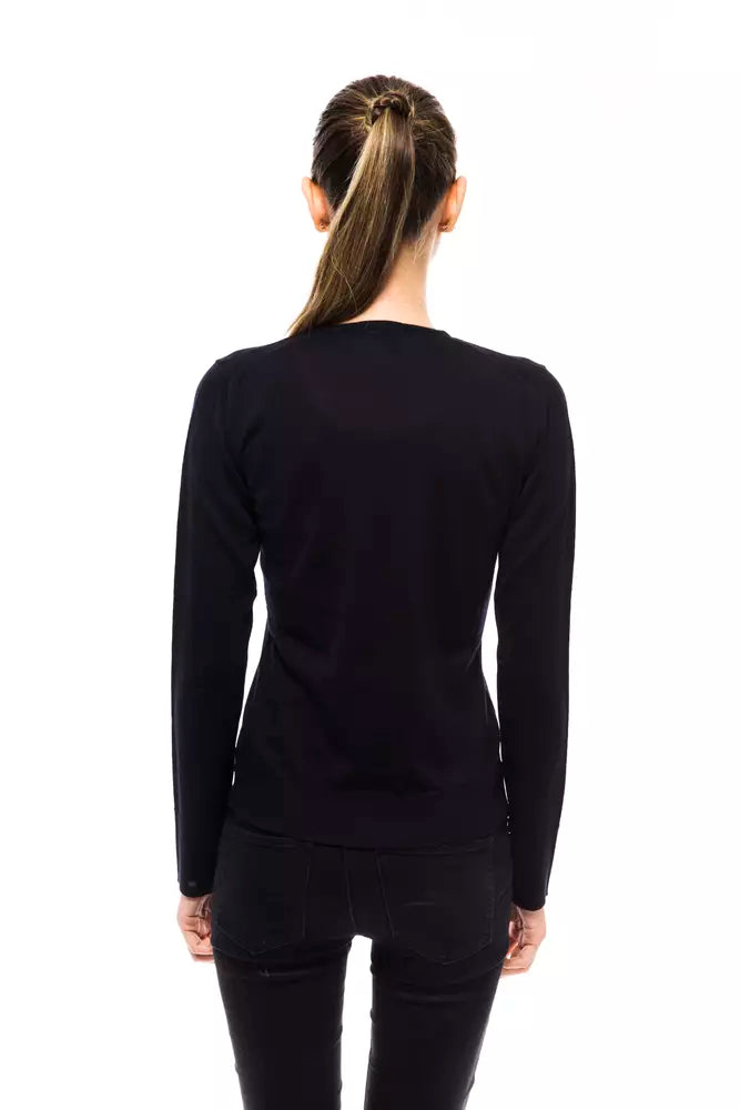 Long sleeve black top on a woman