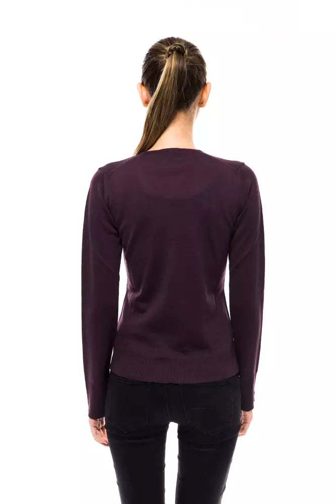 Woman wearing long sleeve purple shirt