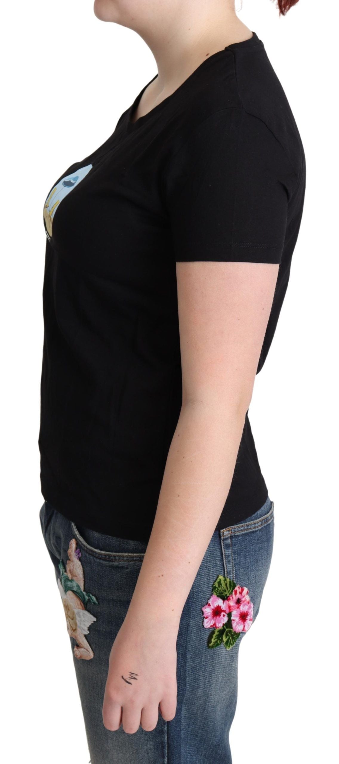 Woman wearing black t-shirt and jeans