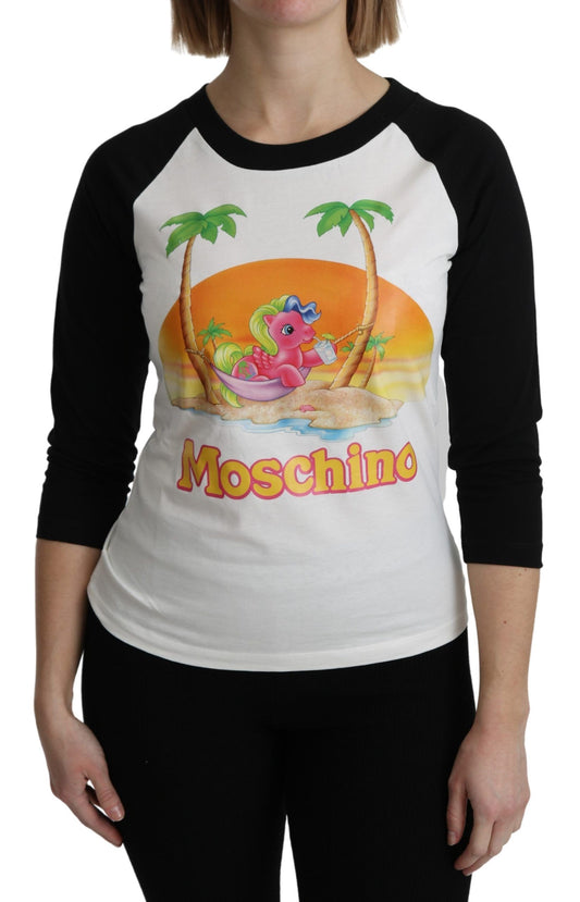 Woman wearing a black and white baseball shirt with a tropical print