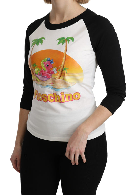 Woman wearing a baseball shirt with palm trees and a beach scene