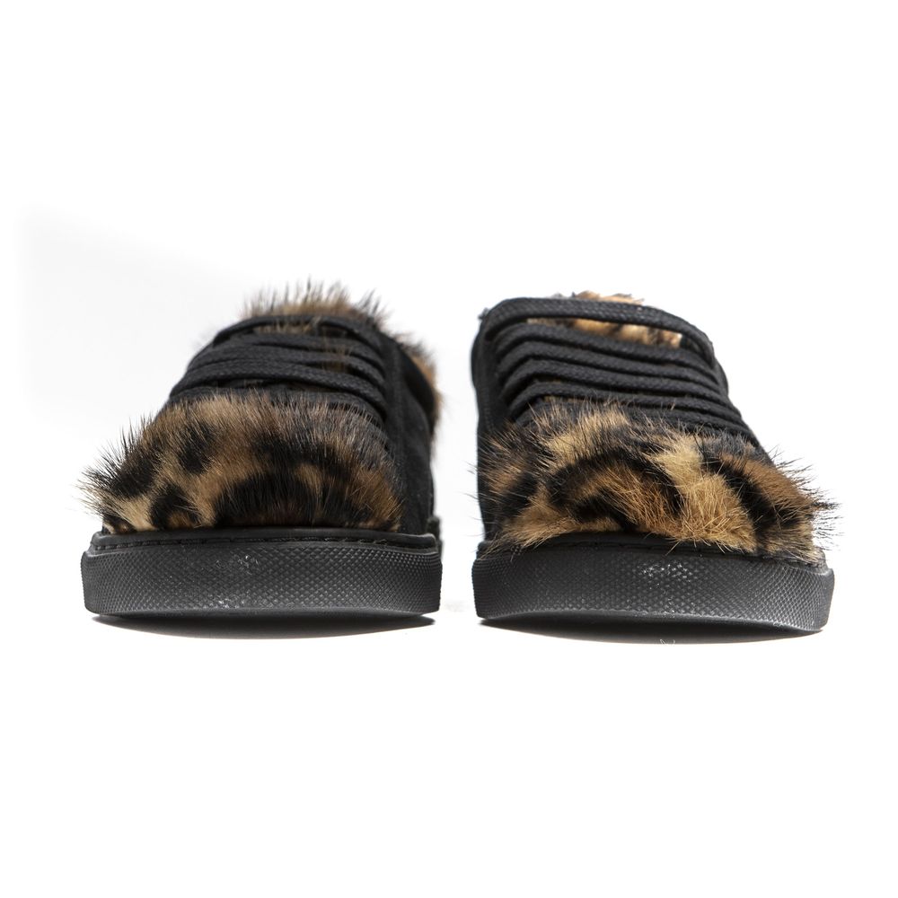 Pair of black leather women's sneakers with fur trim