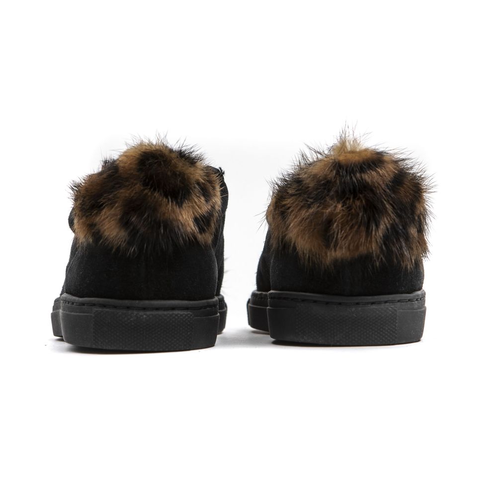 Pair of black leather women's sneakers with fur trim