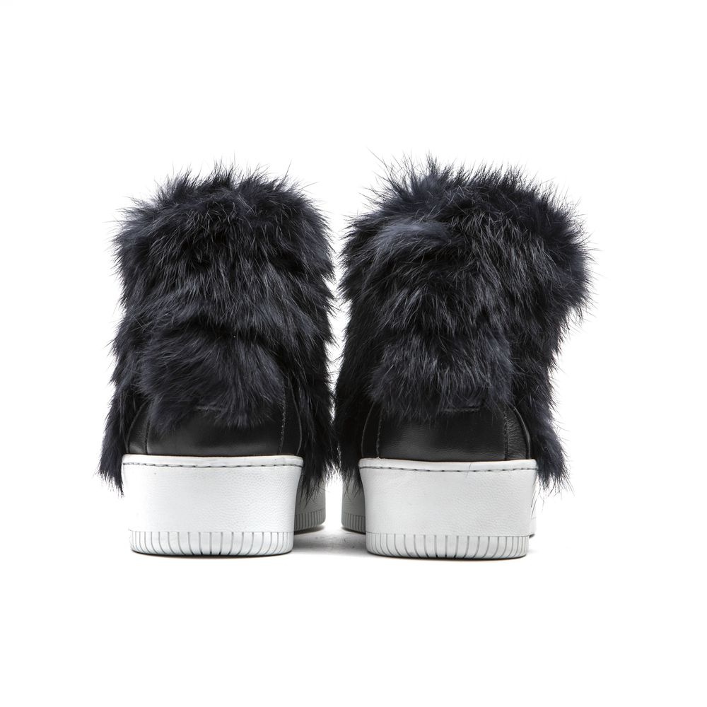 Pair of women's sneakers with white soles, blue cotton upper and fur trim